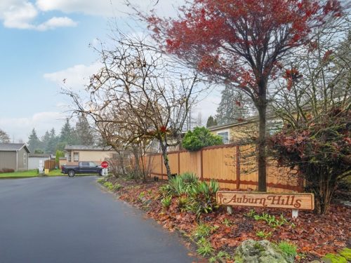 Exterior of home community with welcome sign